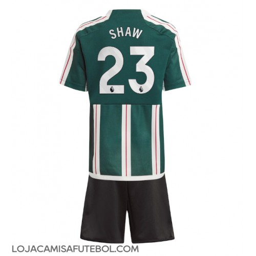 Camisa de Futebol Manchester United Luke Shaw #23 Equipamento Secundário Infantil 2023-24 Manga Curta (+ Calças curtas)
